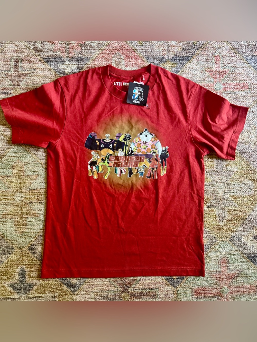 One Piece UT T-shirt with graphic of cartoon characters.